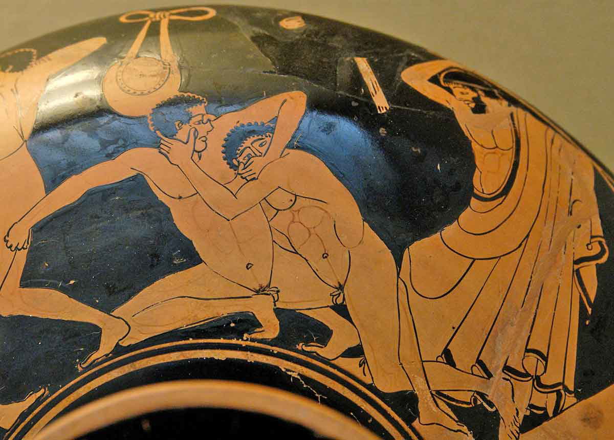 Φάουλ: Ο διαιτητής εντοπίζει και τιμωρεί μια παράνομη οφθαλμογραφία κατά τη διάρκεια αγώνα παγκράτου (δεξιά), Πηγή: Wikimedia Commons